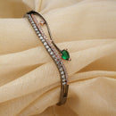 Rhodium Plated Silver Toned Emerald Green Teardrop Shaped American Diamond Stone Studded Kada Bracelet