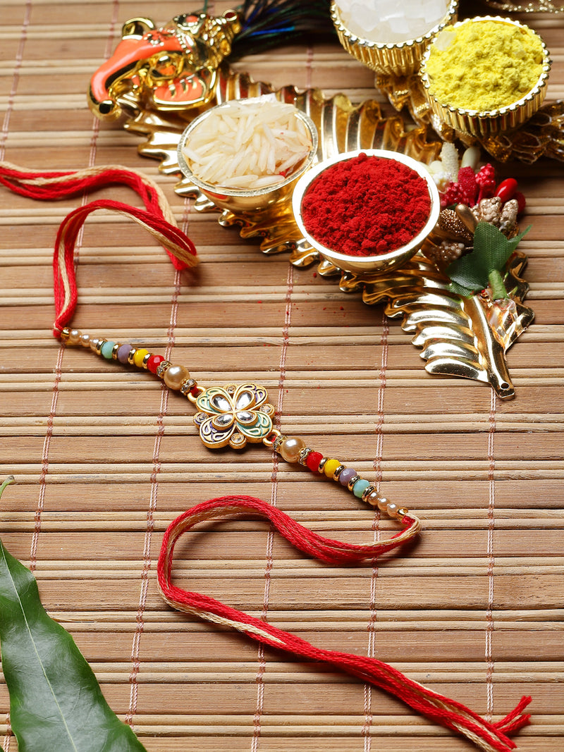Traditional Gold Plated Gold Toned Kundan Studded Floral Rakhi