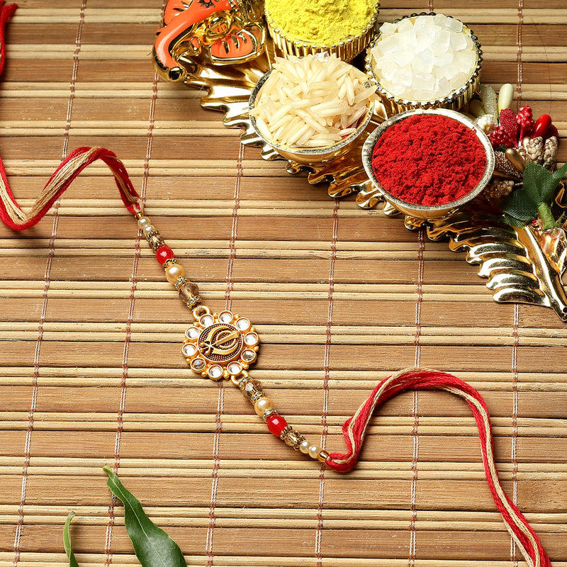 Traditional Gold Plated Gold Toned Khanda Symbol Engraved Rakhi