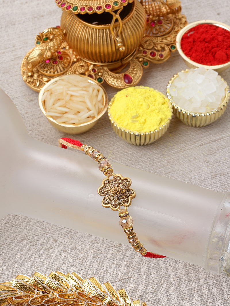 Traditional Gold Plated Gold Toned Floral Rakhi