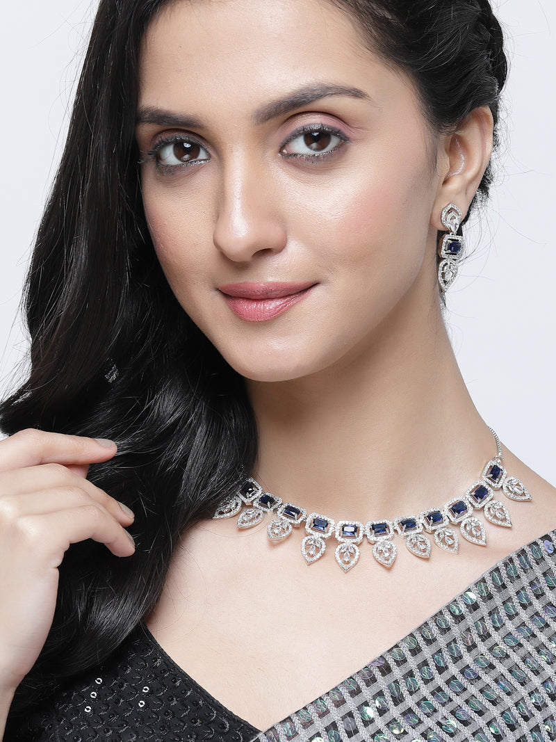 Rhodium-Plated Navy Blue American Diamond Studded Leaf Shaped Necklace with Earring Jewellery Set