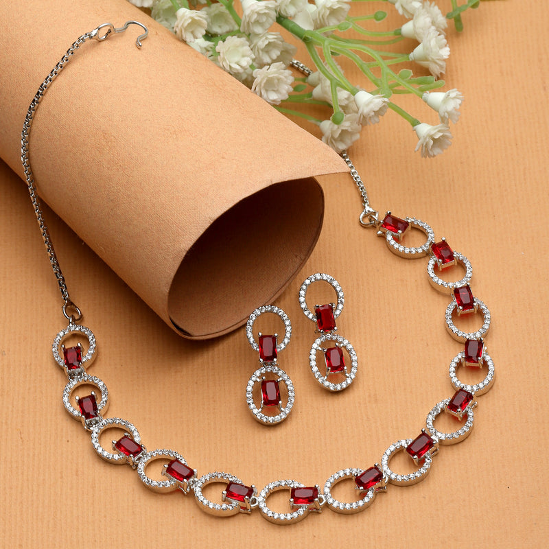 Rhodium-Plated Red American Diamond Studded Disc-Shaped Necklace & Earrings Jewellery Set