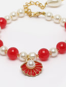 Gold Plated Gold Toned Red Shell Charm Studded Rakhi Bracelet