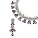 Rhodium-Plated Purple American Diamond Studded Teardrop & Crescent Shaped Necklace with Earrings Jewellery Set