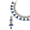 Rhodium-Plated Navy Blue American Diamond Studded Teardrop & Crescent Shaped Necklace with Earrings Jewellery Set