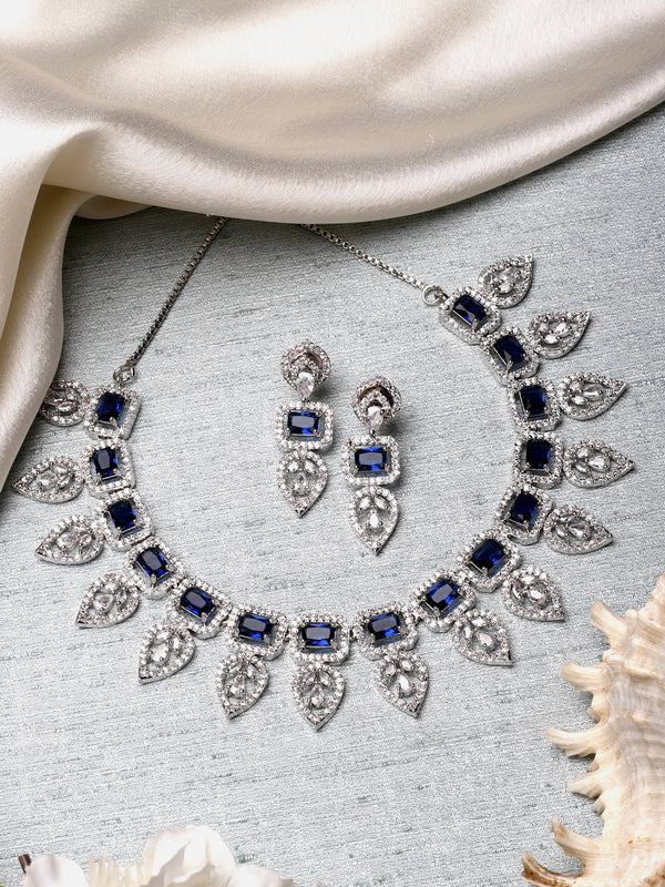 Rhodium-Plated Navy Blue American Diamond Studded Leaf Shaped Necklace with Earring Jewellery Set