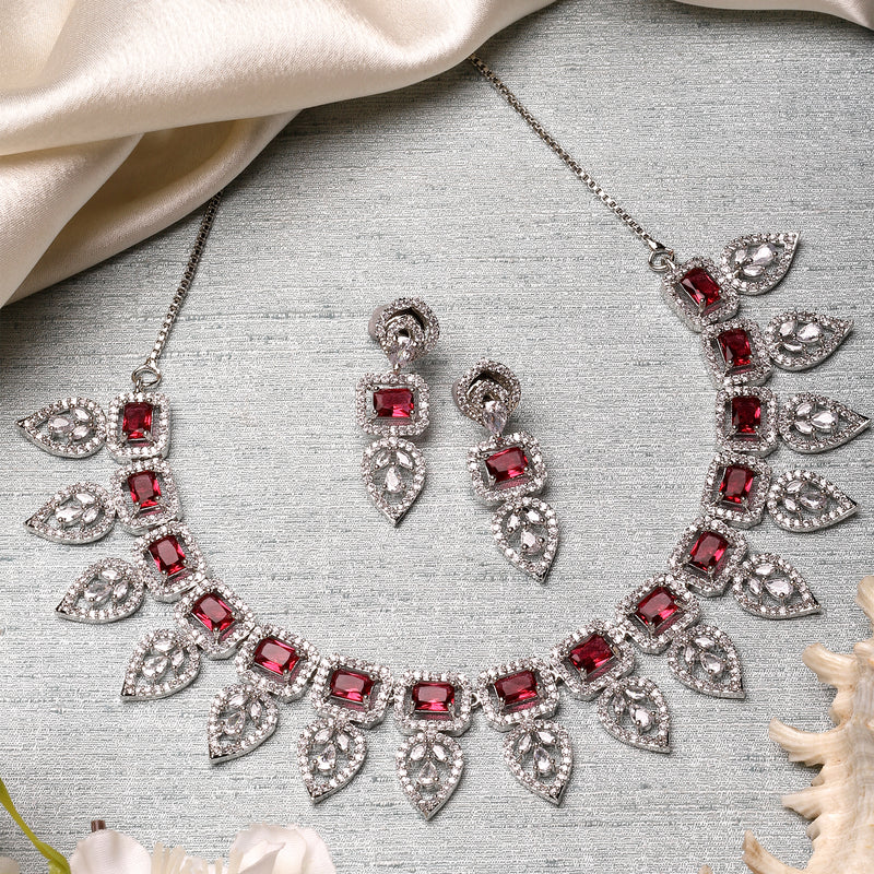 Rhodium-Plated Red American Diamond Studded Leaf Shaped Necklace with Earrings Jewellery Set