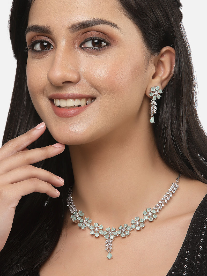 Rhodium-Plated Silver Tone Flower Sea Green American Diamond Studded Necklace with Earrings Jewellery Set