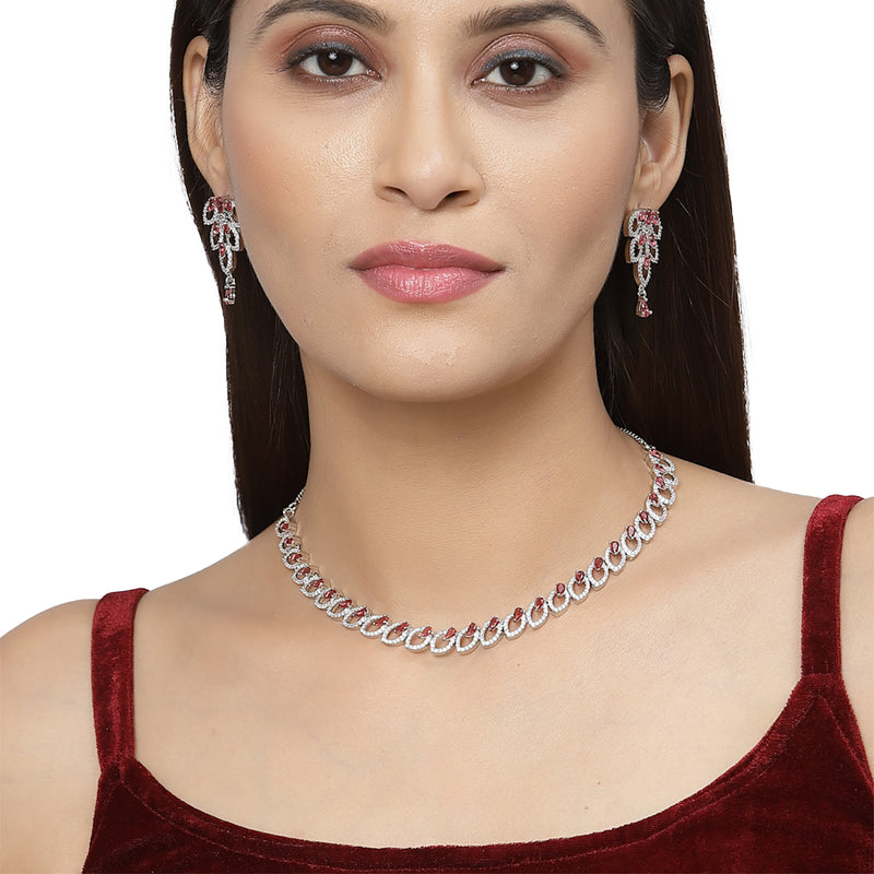 Rhodium-Plated Red American Diamond Studded Leaf Shaped Necklace with Earrings Jewellery Set