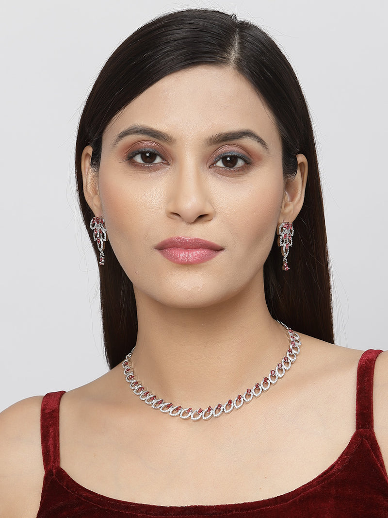 Rhodium-Plated Red American Diamond Studded Leaf Shaped Necklace with Earrings Jewellery Set