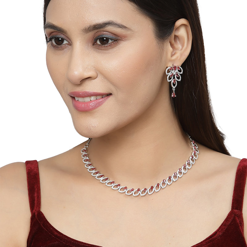 Rhodium-Plated Red American Diamond Studded Leaf Shaped Necklace with Earrings Jewellery Set