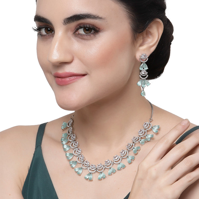 Rhodium-Plated Sea Green American Diamond Studded Teardrop & Crescent Shaped Necklace with Earrings Jewellery Set