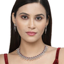 Rhodium-Plated Red American Diamond Studded Floral & Leaf Shaped Necklace with Earrings Jewellery Set