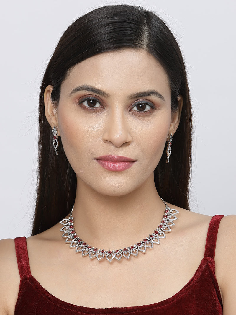 Rhodium-Plated Red American Diamond Studded Floral & Leaf Shaped Necklace with Earrings Jewellery Set