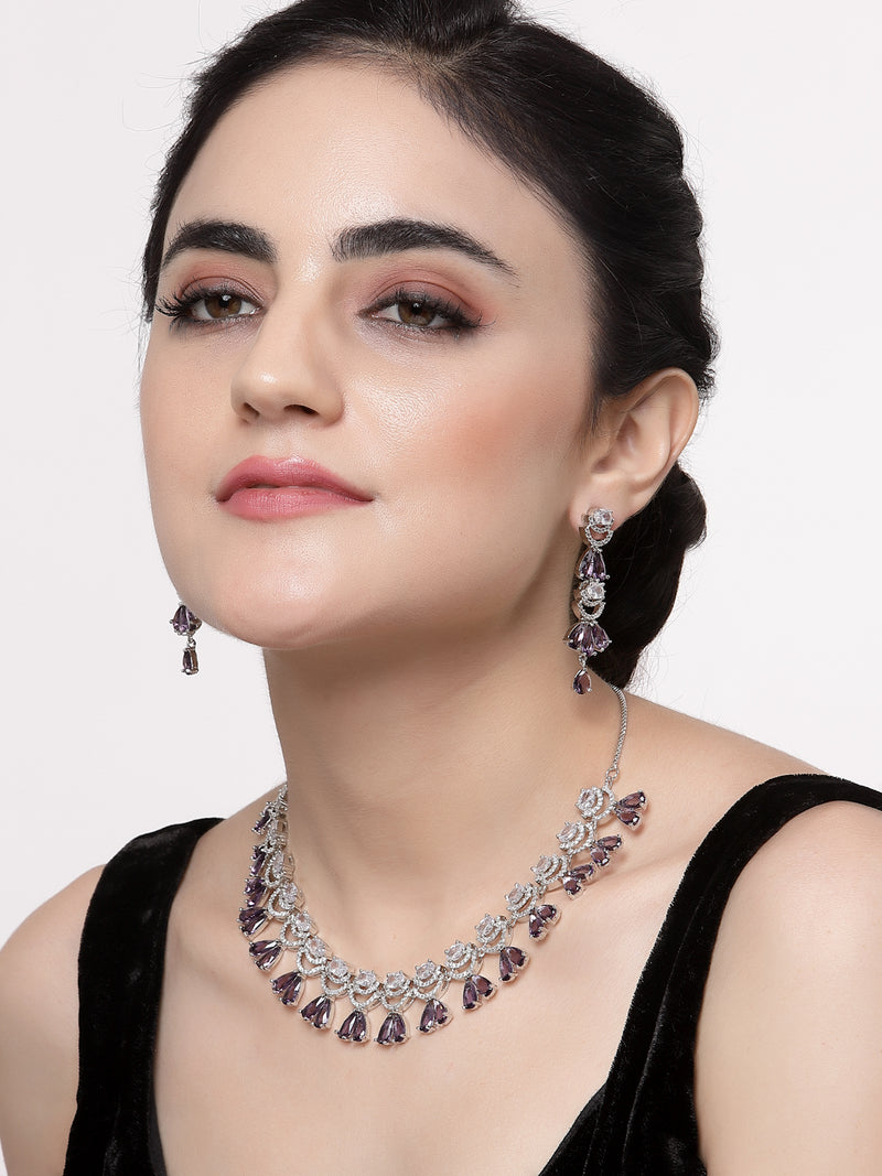 Rhodium-Plated Purple American Diamond Studded Teardrop & Crescent Shaped Necklace with Earrings Jewellery Set
