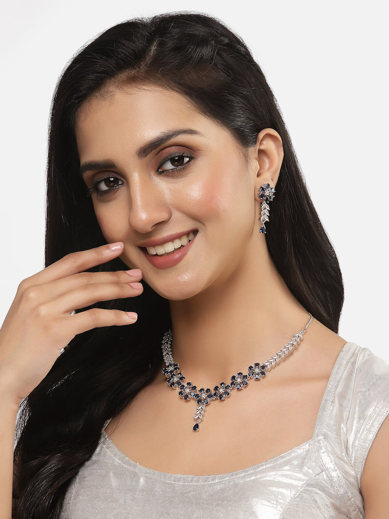 Rhodium-Plated Silver Toned Flower Navy Blue American Diamond Studded Necklace with Earrings Jewellery Set