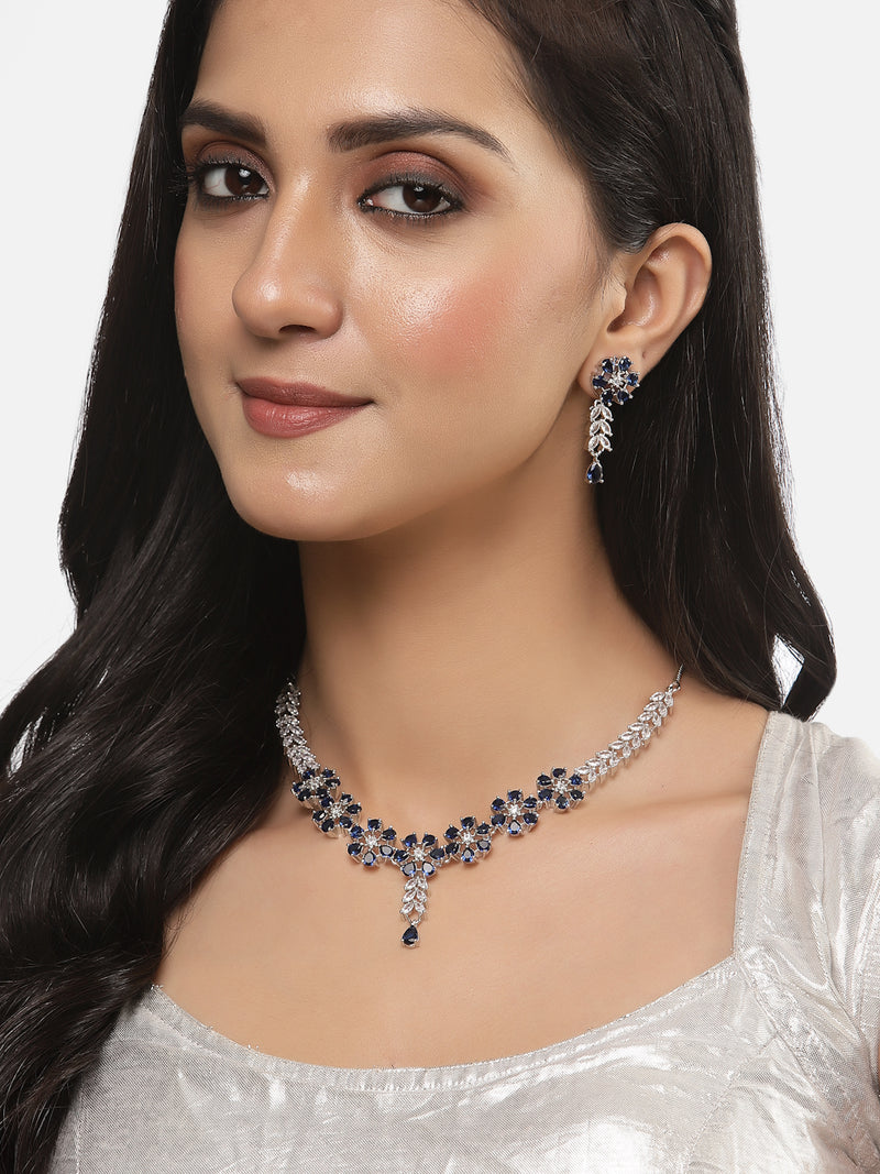 Rhodium-Plated Silver Toned Flower Navy Blue American Diamond Studded Necklace with Earrings Jewellery Set