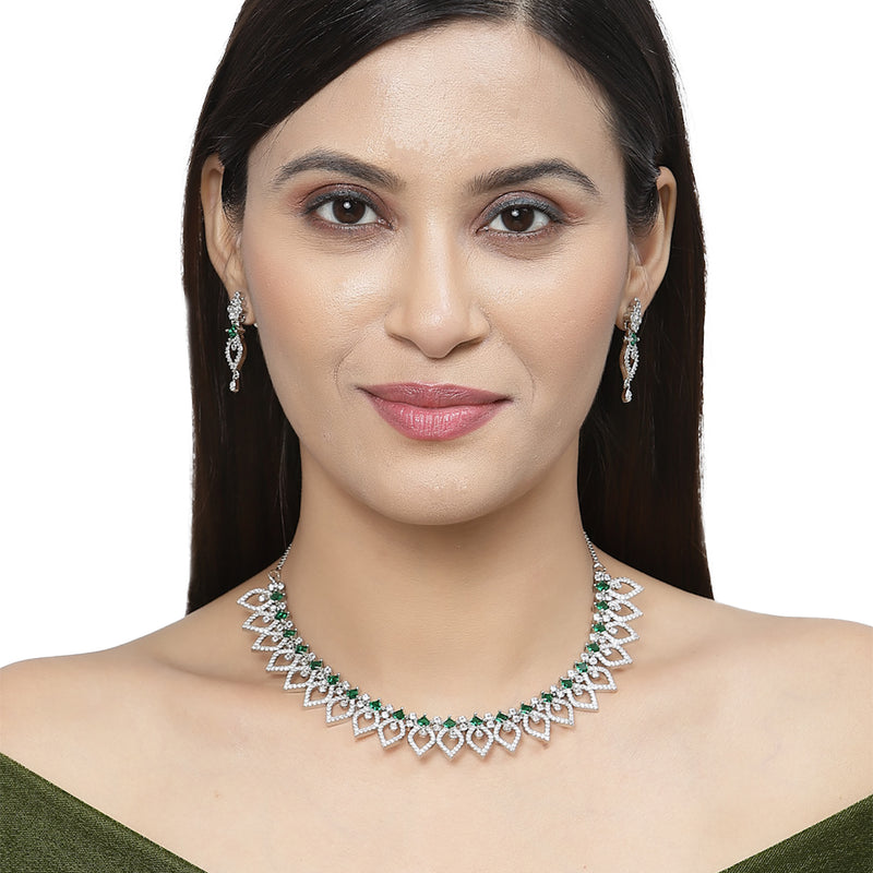Rhodium-Plated Green American Diamond Studded Floral & Leaf Shaped Necklace with Earrings Jewellery Set