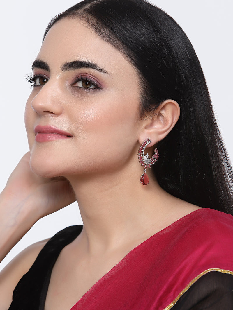 Rhodium-Plated Red American Diamond studded Peacock & Feather Shaped Drop Earrings