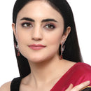 Rhodium-Plated Red American Diamond studded Peacock & Feather Shaped Drop Earrings