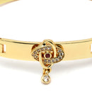 Gold-Plated Oval Shaped White & Red Cubic Zirconia Stone studded Knot Bracelet