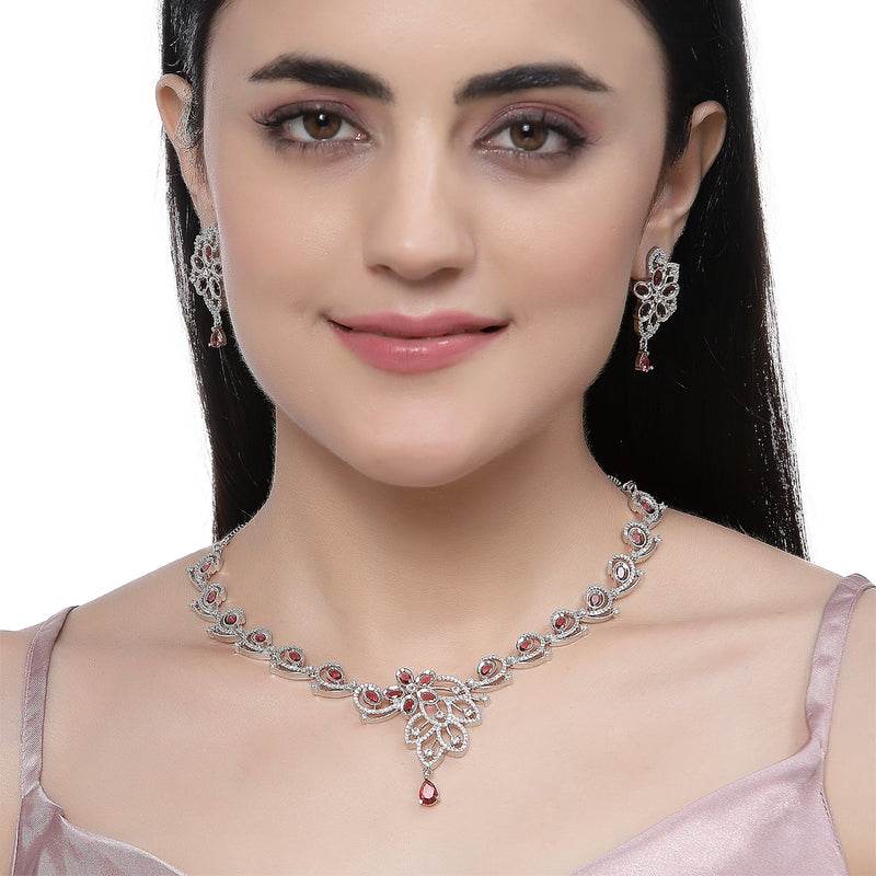 Rhodium-Plated Red American Diamond Studded Floral & Paisley Shaped Necklace with Earrings Jewellery Set