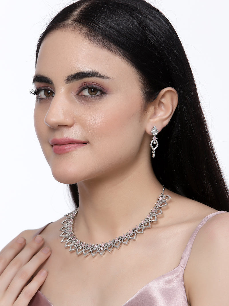 Rhodium-Plated Pink American Diamond Studded Floral & Leaf Shaped Necklace with Earrings Jewellery Set