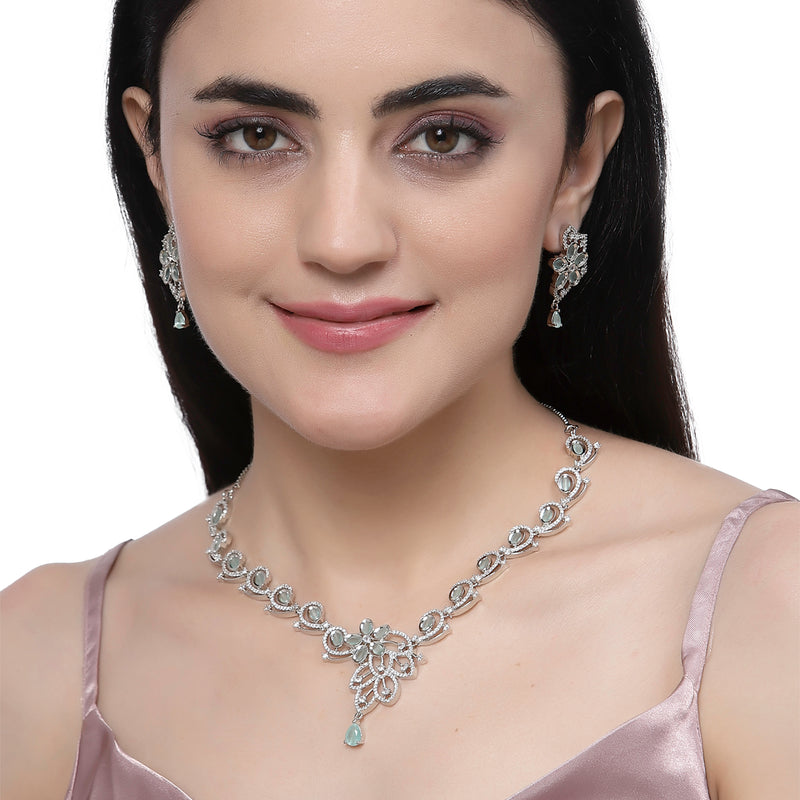 Rhodium-Plated Sea Green American Diamond Studded Floral & Paisley Shaped Necklace with Earrings Jewellery Set