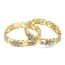 Set Of 4 Gold-Plated White American Diamond studded Dual Toned Paisley and Floral Design Bangles