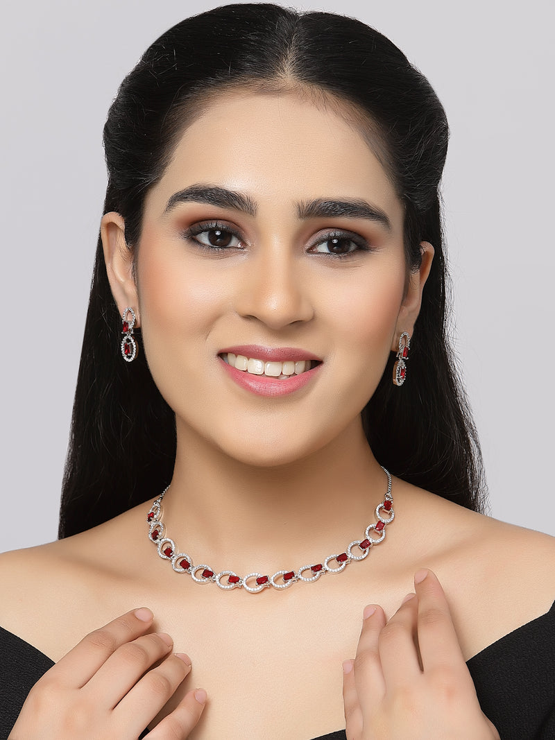 Rhodium-Plated Red American Diamond Studded Disc-Shaped Necklace & Earrings Jewellery Set