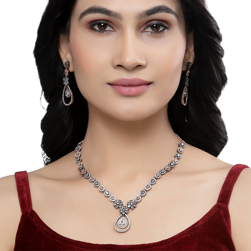 Rose Gold-Plated Gunmetal Toned White American Diamond Studded Teardrop & Floral Shape Jewellery Set