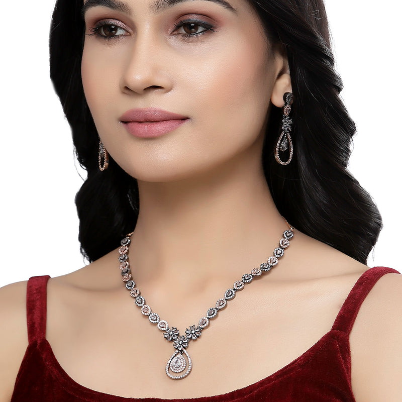 Rose Gold-Plated Gunmetal Toned White American Diamond Studded Teardrop & Floral Shape Jewellery Set