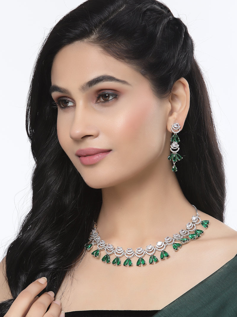 Rhodium-Plated Green American Diamond Studded Teardrop & Crescent Shaped Necklace with Earrings Jewellery Set