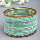 Gold-Plated Turquoise Blue Matte Finish Velvet White American Diamonds Studded Bangles Set Of 36
