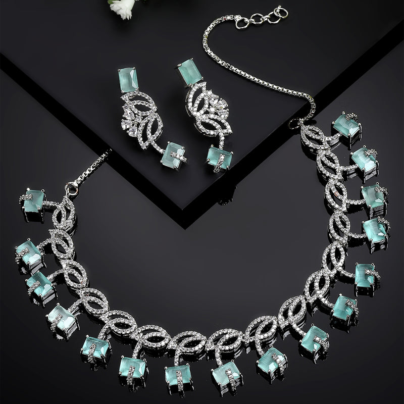 Rhodium-Plated with Silver-Toned Leaf Design Sea Green and White American Diamond Studded Jewellery Set