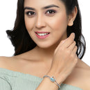 Rhodium Plated Silver Toned Flower Shaped Sky Blue American Diamond Studded Bracelet