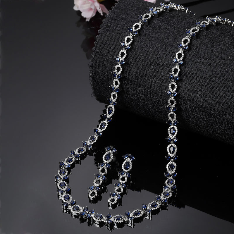 Rhodium-Plated Silver Toned Leaf Navy Blue American Diamond Studded Long Necklace with Drop Earrings Jewellery Set