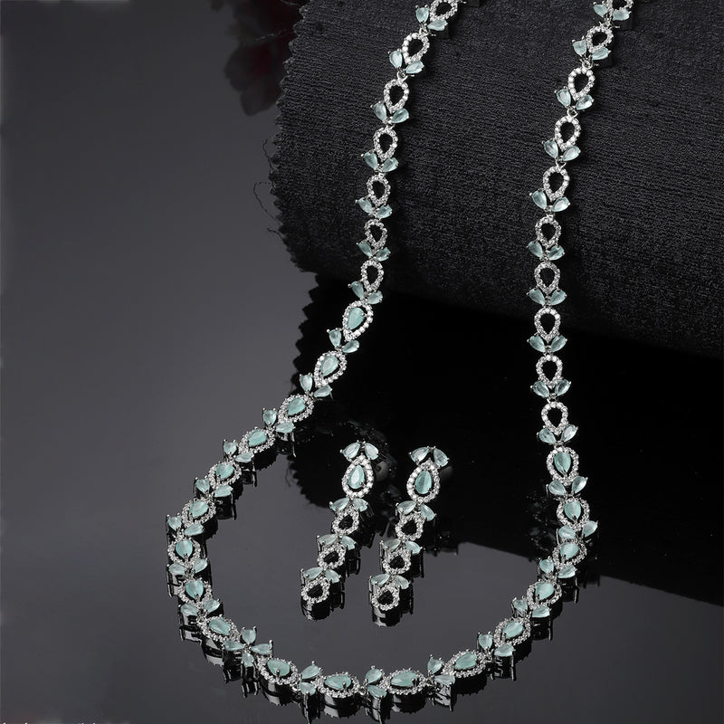 Rhodium-Plated Silver Toned Leaf Sea Green American Diamond Studded Long Necklace with Drop Earrings Jewellery Set