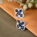 Rhodium-Plated Navy Blue American Diamond studded Floral Shaped Stud Earrings