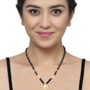 Gold-Plated Black & White Artificial Stones Studded & Beads Beaded Round Shaped Locket Mangalsutra