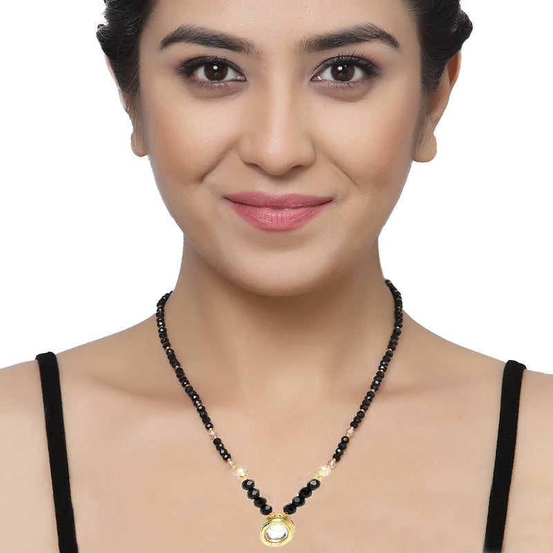 Gold-Plated Black & White Artificial Stones Studded & Beads Beaded Round Shaped Locket Mangalsutra