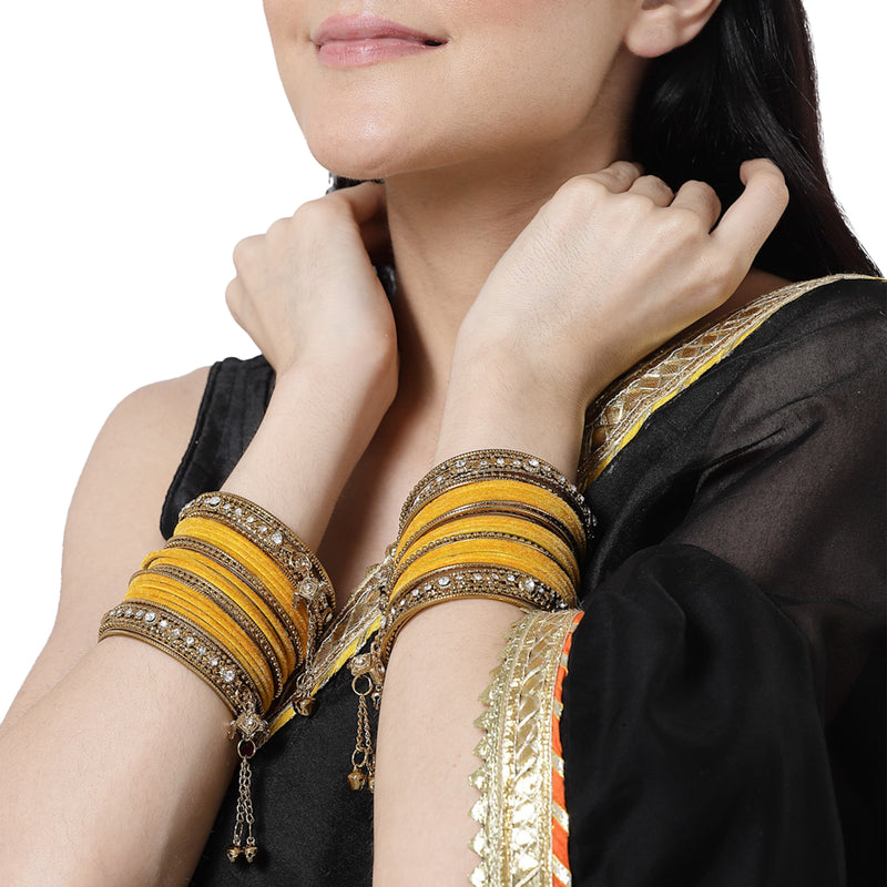 Gold-Plated Yellow Matte Finish Velvet AD Studded Gold Pearl Tasselled Bangles Set Of 56
