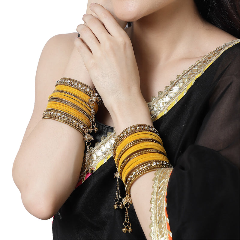 Gold-Plated Yellow Matte Finish Velvet AD Studded Gold Pearl Tasselled Bangles Set Of 56
