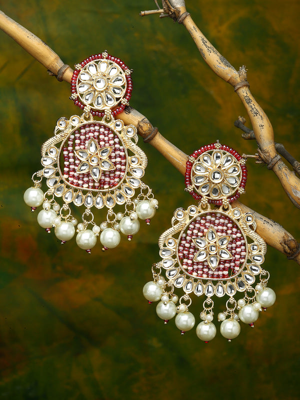 Gold-Plated Pink Beads White Pearls & Kundan studded Handcrafted Peacock Shaped Drop Earrings