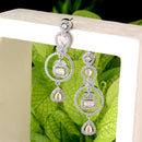 Rhodium-Plated Pink American Diamond studded Circular Shaped Drop Earrings