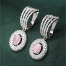Rhodium-Plated Pink American Diamond studded Handcrafted Oval Shaped Drop Earrings