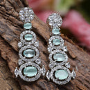 Rhodium-Plated Sea Green American Diamond studded Quirky Shaped Drop Earrings