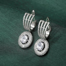 Rhodium Plated Oval White AD Studded Contemporary Long Drop Earrings