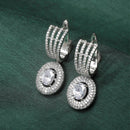 Rhodium-Plated White American Diamond studded Handcrafted Oval Shaped Drop Earrings