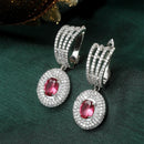 Rhodium-Plated Red American Diamond studded Handcrafted Oval Shaped Drop Earrings